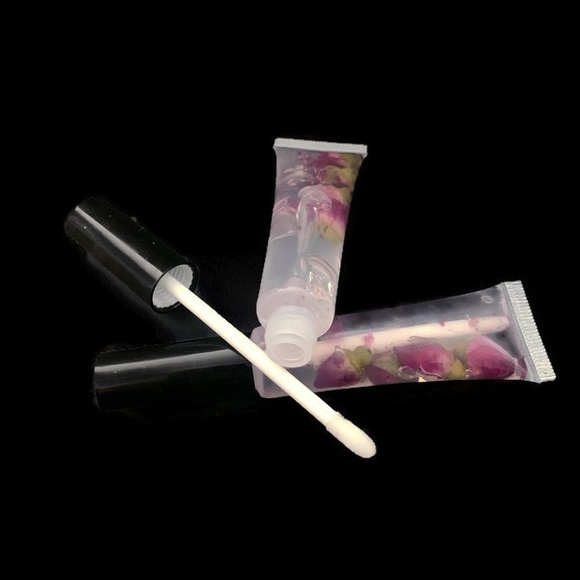 For all 3 /$15  Essentials Lip glosses with rose flower buds - Picture 5 of 8